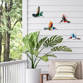 Dreamskip hummingbird wall art on fence decor complements garden spaces.