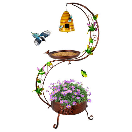 DreamSoul birdbath with flower planter copper finish attracts birds and adds color.