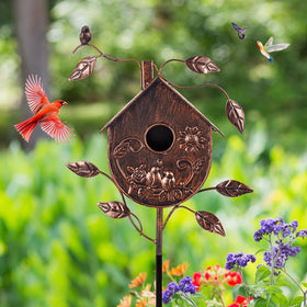 DREAMSOUL vintage metal bird house blends with patio decor and yard scenery.