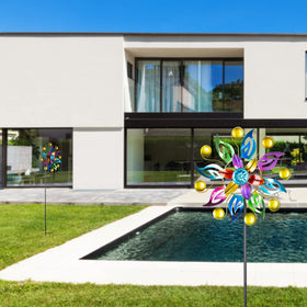 Dreamysoul wind spinner with 11 inch blade diameter adds color to the lawn.