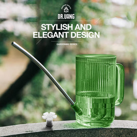 DR.UANG green watering can being held for convenient plant care