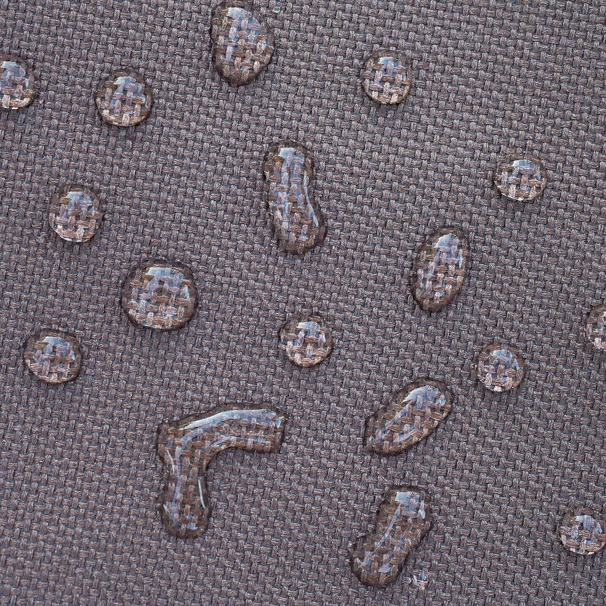 Duck Covers mocha cappuccino grill cover adds warm aesthetic to patios.