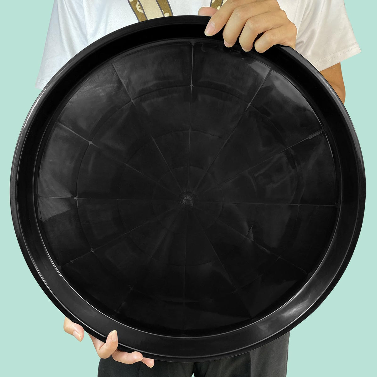 DUNPUTE plant saucer 10-inch blends with modern interiors and protects surfaces.