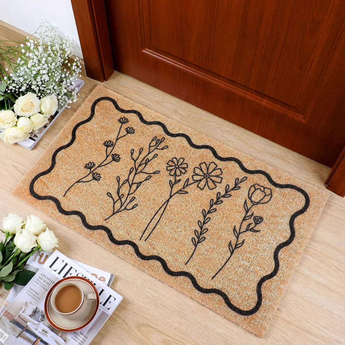 Dunzy floral welcome mat at the front door with a wildflower pattern that traps dust.