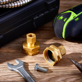 Dunzy packaged two adapters for flexible hose connections in home or garden setups.