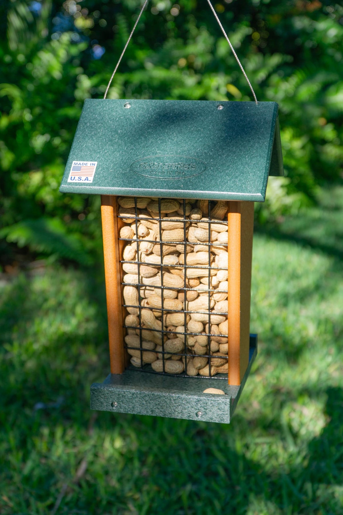 DutchCrafters outdoor feeder designed for woodpeckers and blue jays at a height.
