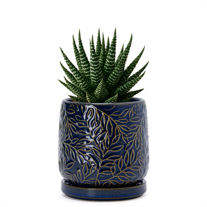 Dvine Dev 4-inch embossed leaves planter in midnight blue for stylish indoor displays.