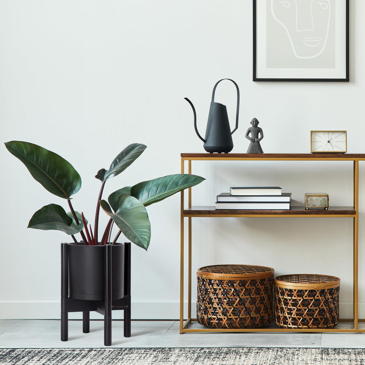 D'vine Dev ebony wood stand provides sturdy elevation for the planter.