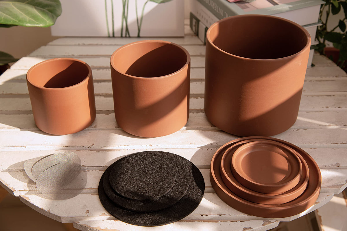 D'vine Dev rust terracotta pot 5.3-inch with porous clay promoting root airflow for succulents.