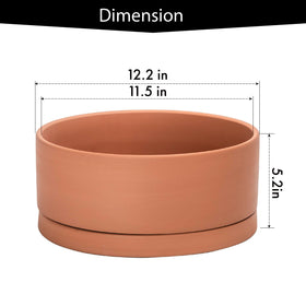 D'vine Dev terracotta pot close-up showing drainage hole detail and porous surface.