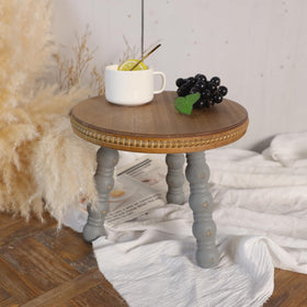 Dwellington Wood Morden Farmhouse Plant Stand in living room with greenery.