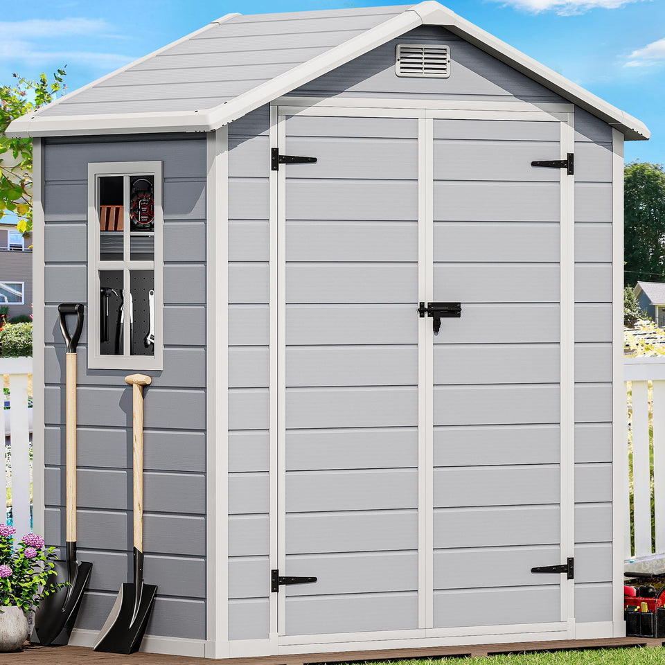 DWVO 6x4 ft resin storage shed exterior shows durable, weatherproof housing for garden tools.
