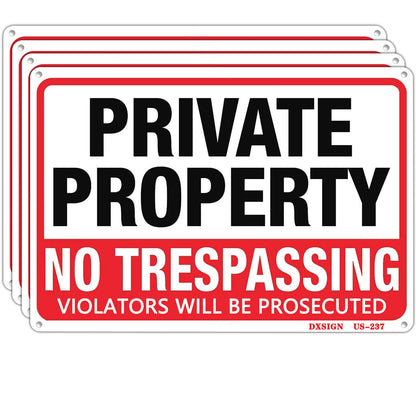 DXSIGN 4-pack no trespassing sign on front-yard fence for clear property boundaries.
