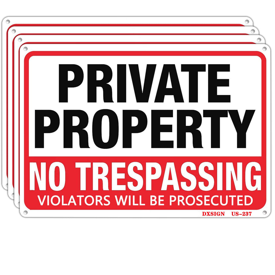 DXSIGN 4-pack no trespassing sign on front-yard fence for clear property boundaries.