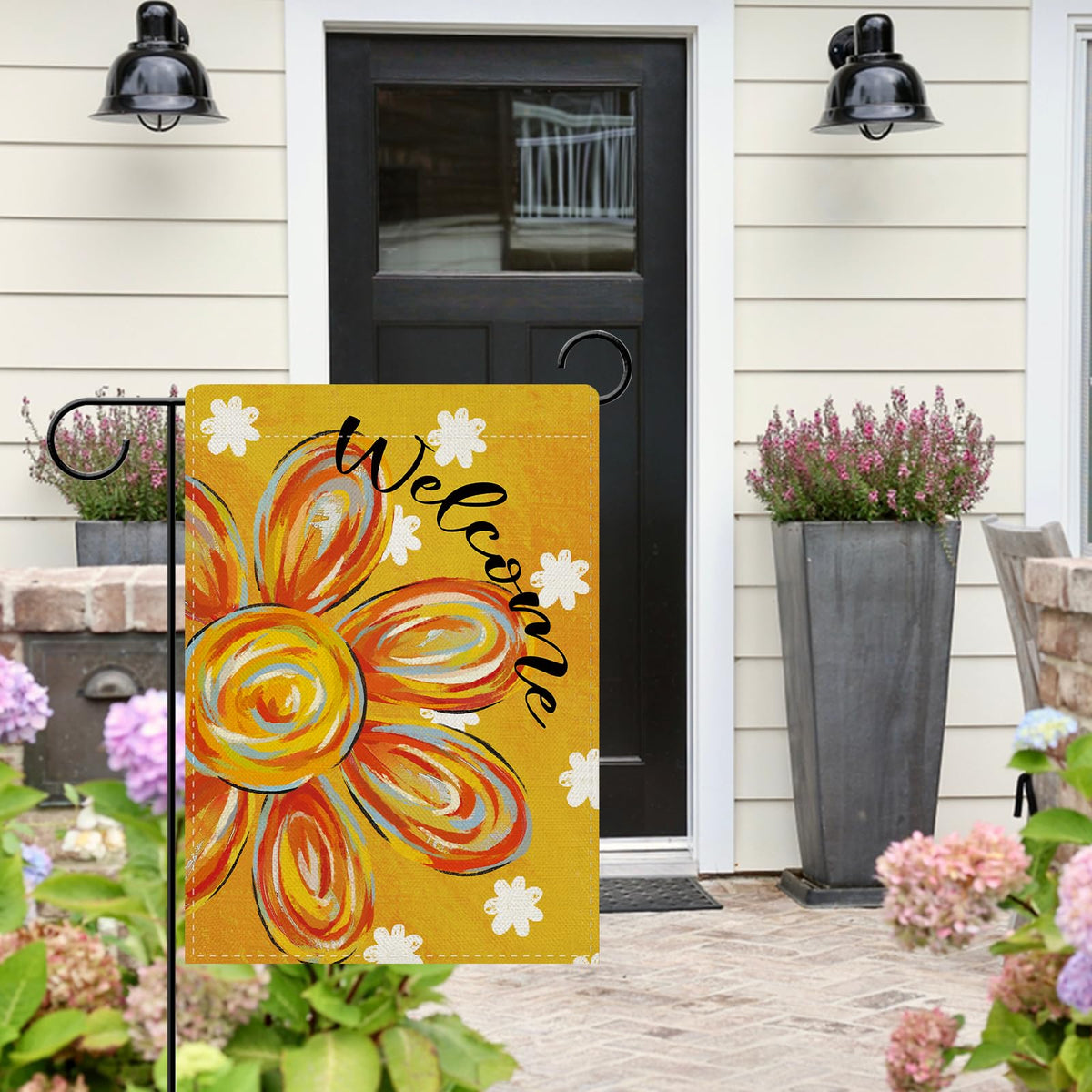 Dyrenson Welcome Sunflower flag hanging on a pole for porch decor
