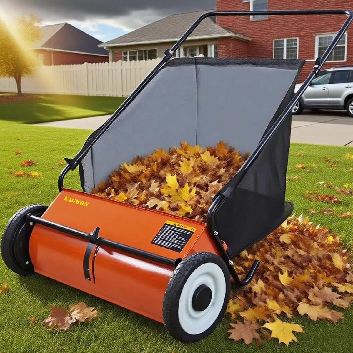 EAGWON four-brush lawn sweeper showing robust sweeping action.