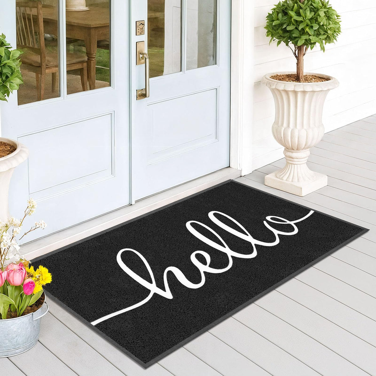 EARTHALL Funny Hello Mat at the front door traps dirt for cleaner interiors.