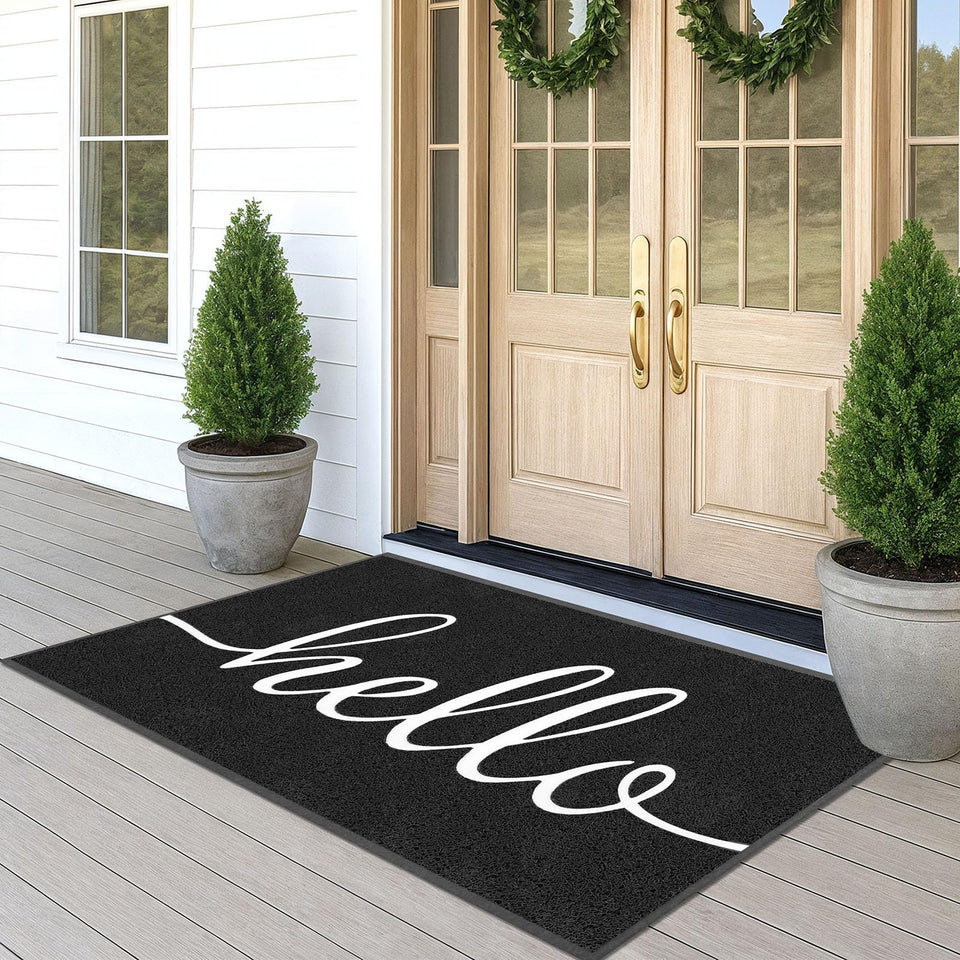 EARTHALL Hello Mat at the front door traps dirt while staying thin and low-profile.