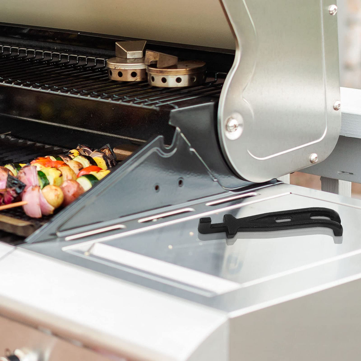 EasiBBQ simple tool for safer, faster grate changes and storage