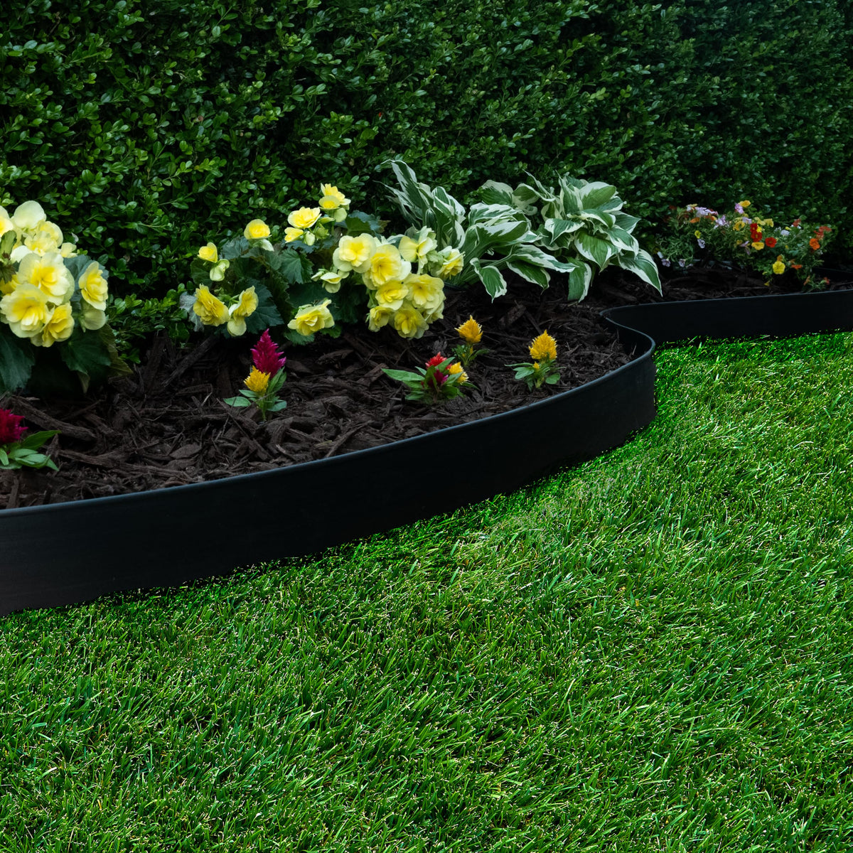 EasyFlex edge keeps grass back, creating a neat lawn-to-bed transition.