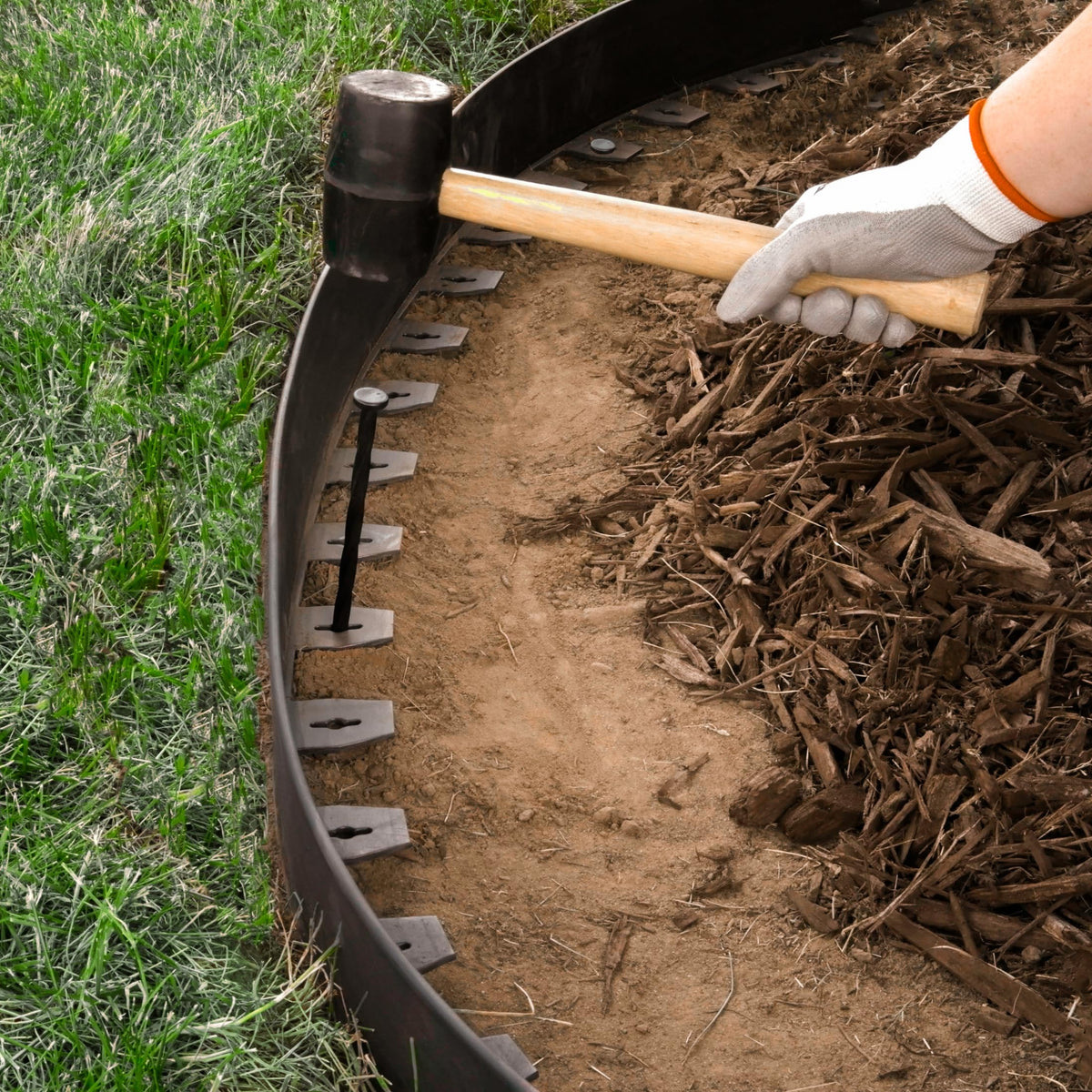EasyFlex L-shaped profile rests on soil to protect roots and reduce digging.