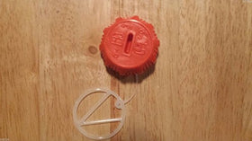 Side view of the echosari fuel cap demonstrates easy replacement on Echo chainsaws