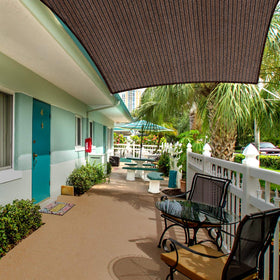 Eden's Decor shade sail over patio or garden reduces heat and enhances breeze.