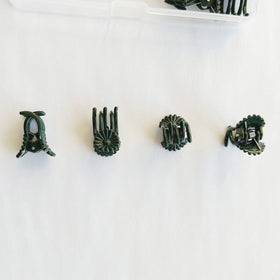 EESC2Y dark-green clips blend with foliage for subtle plant care.