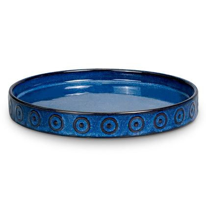 Eightpot blue round 11.4-inch saucer catches excess water and protects surfaces.