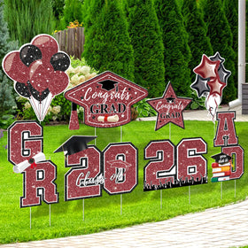 EIMMBD 2026 GRAD letters brighten outdoor graduation displays.