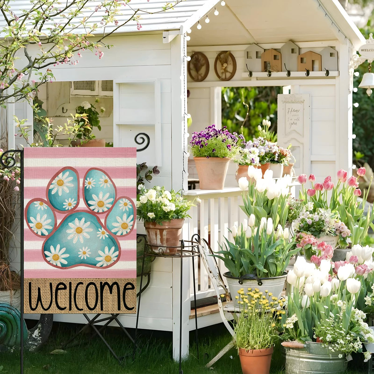 EKOREST double-sided flag shows vibrant watercolor dog paw and daisies.