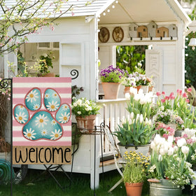 EKOREST double-sided flag shows vibrant watercolor dog paw and daisies.