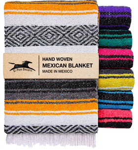 El Paso Designs Mexican yoga blanket with yellow tassels for warm, comfy practice.