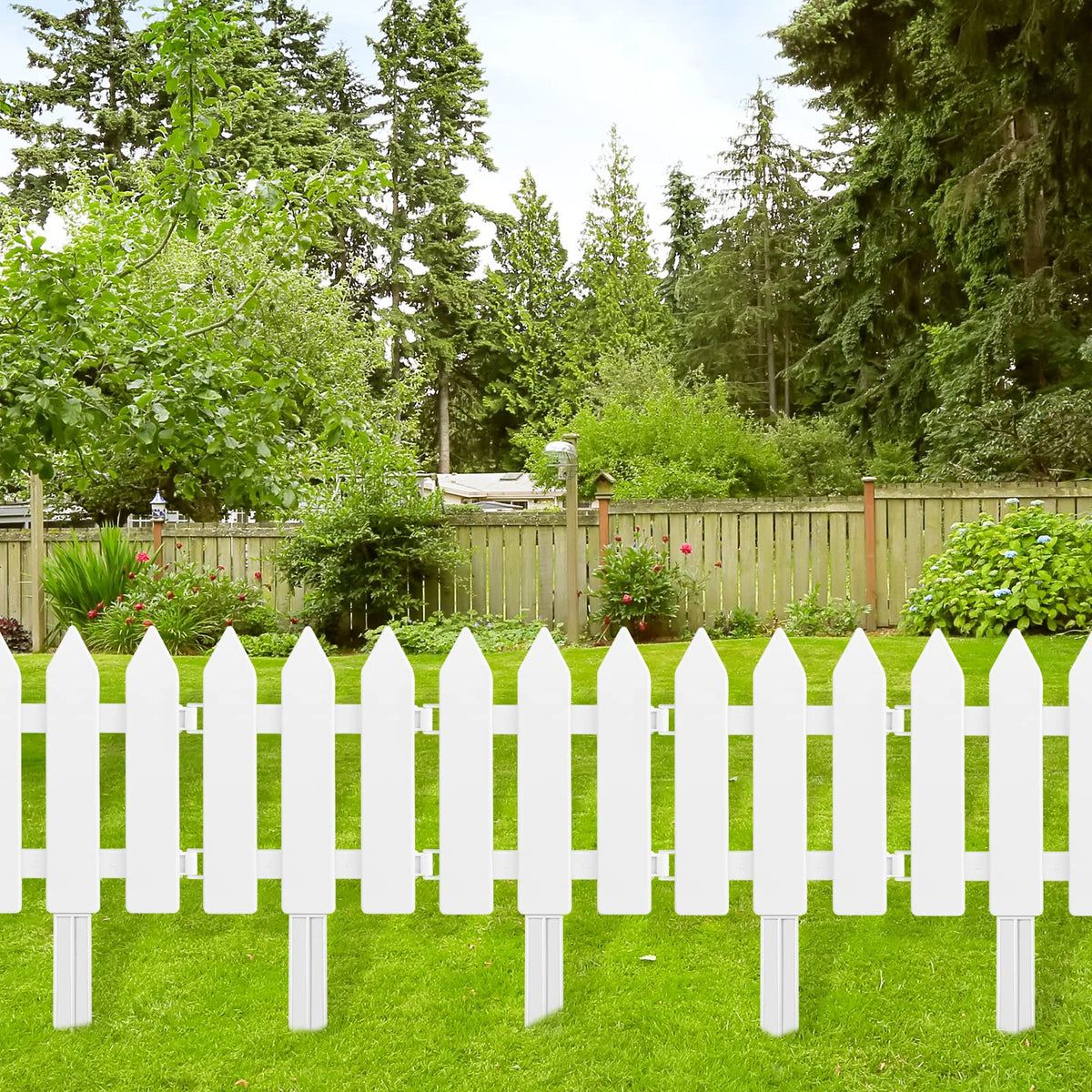 ELECLAND fence around a tree demonstrates curved-border versatility.