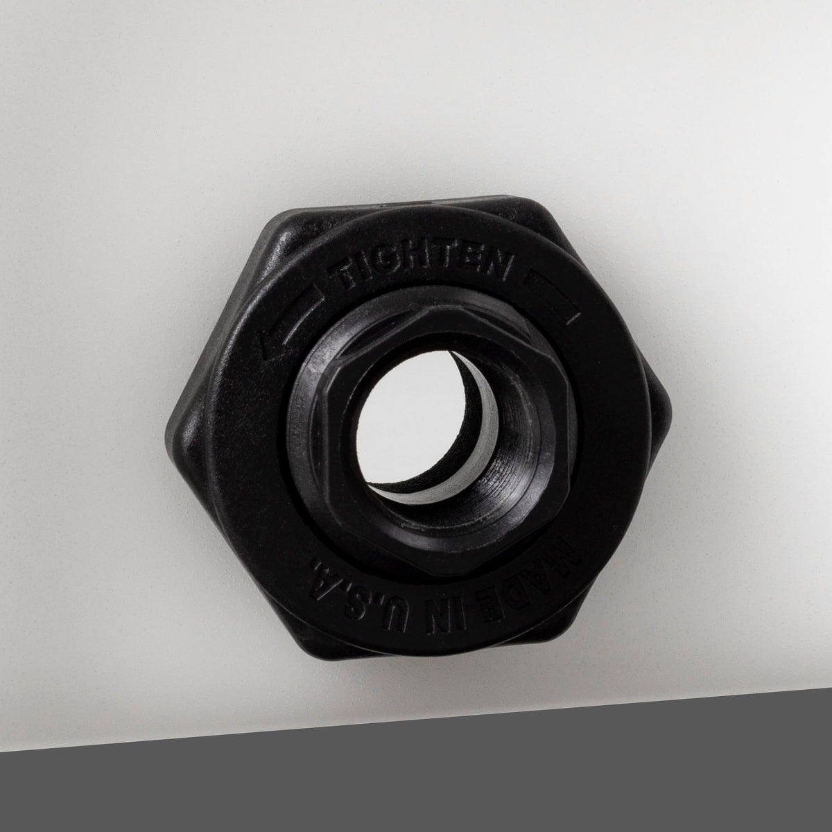 Elkhart Plastics molded gallon and liter indicators for level checks.