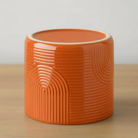 Elegant tabletop planter by ÈMJÉ LUXE adds contemporary warmth to any room.