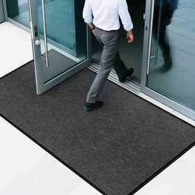 EMQIMA front door mat with non-slip backing for secure placement.