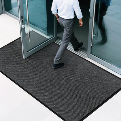 EMQIMA front door mat with non-slip backing for secure placement.