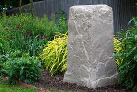 Emsco Group rock with two stakes anchors keeps the feature upright during storms.