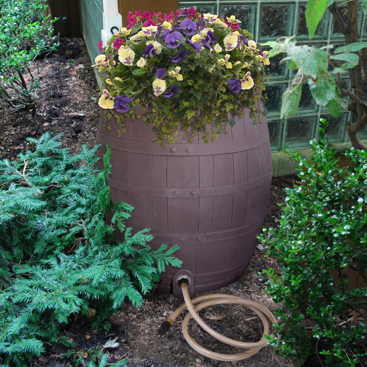 Emsco Group Rescue whiskey rain barrel with diverter system for efficient rainfall collection.