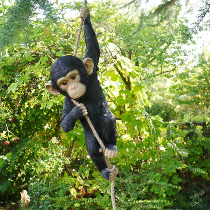 The Enchanted Garden Hanging Monkey on rope adds playful curb appeal to porches and gardens.