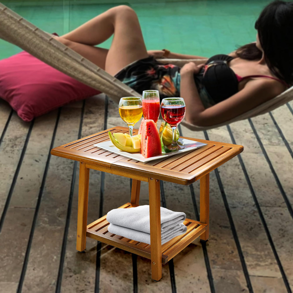ENKEZI Acacia wood end table in brown teak complements garden lounges.