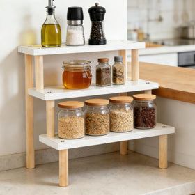 Eorbow cupcake and spice display on a desk or counter