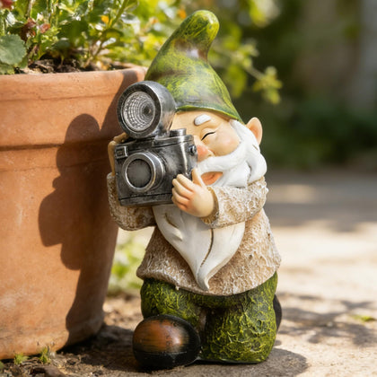 EPTUEGA garden gnome solar light illuminates outdoor paths with warm glow.