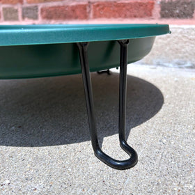 Erva ground level bird bath features sturdy legs for stable placement