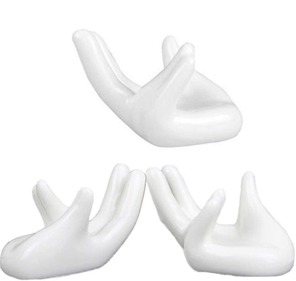 Eshylala 3-pack ceramic air plant holders in a hand shape for stylish desk decor.