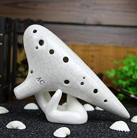 Ceramic hand-hold with minimalist design blending into any desktop setup by Eshylala.
