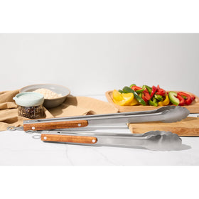 Esie Houzie tongs with a hanging loop for easy kitchen storage.