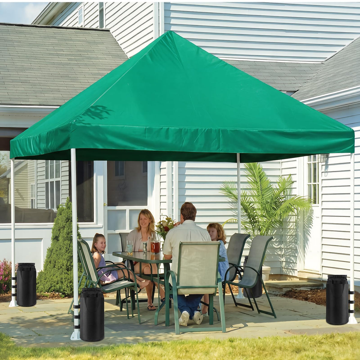 Four-pack Esmorah canopy weight bags ready for quick outdoor setup