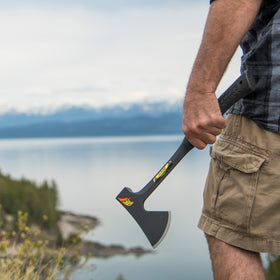 Estwing Camper's Axe demonstrates outdoor versatility for chopping logs and kindling.